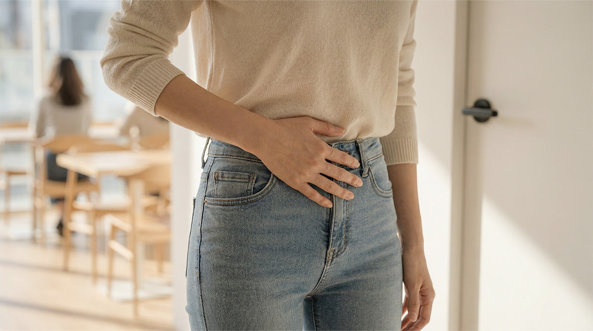 What is the meaning of IBS and what causes its symptoms
