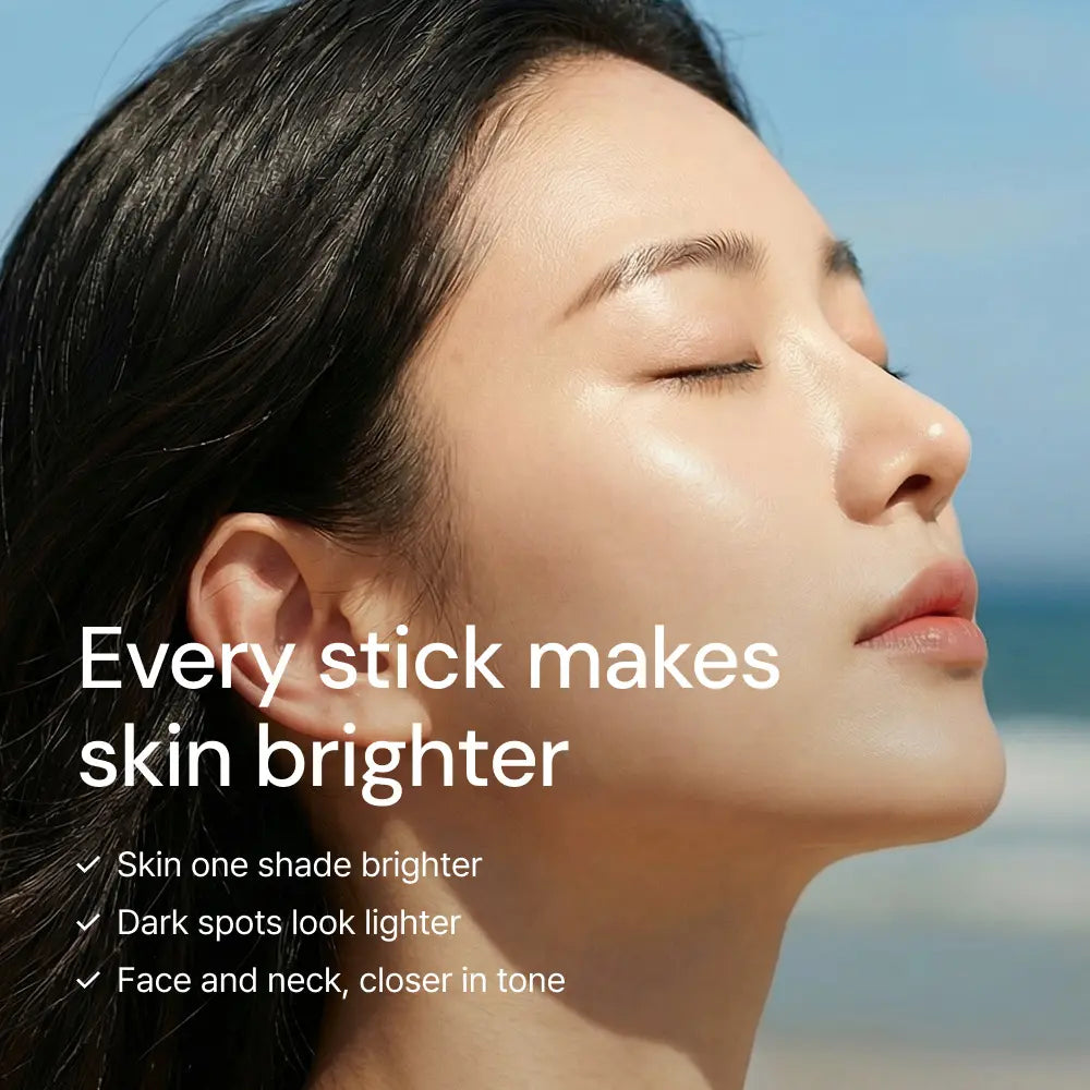 Close-up of a woman's face in sunlight by the sea from the YoungLong Berry White campaign