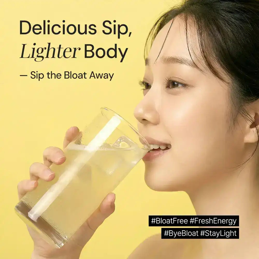 Woman drinking a clear supplement drink for bloating relief with wellness text on yellow background