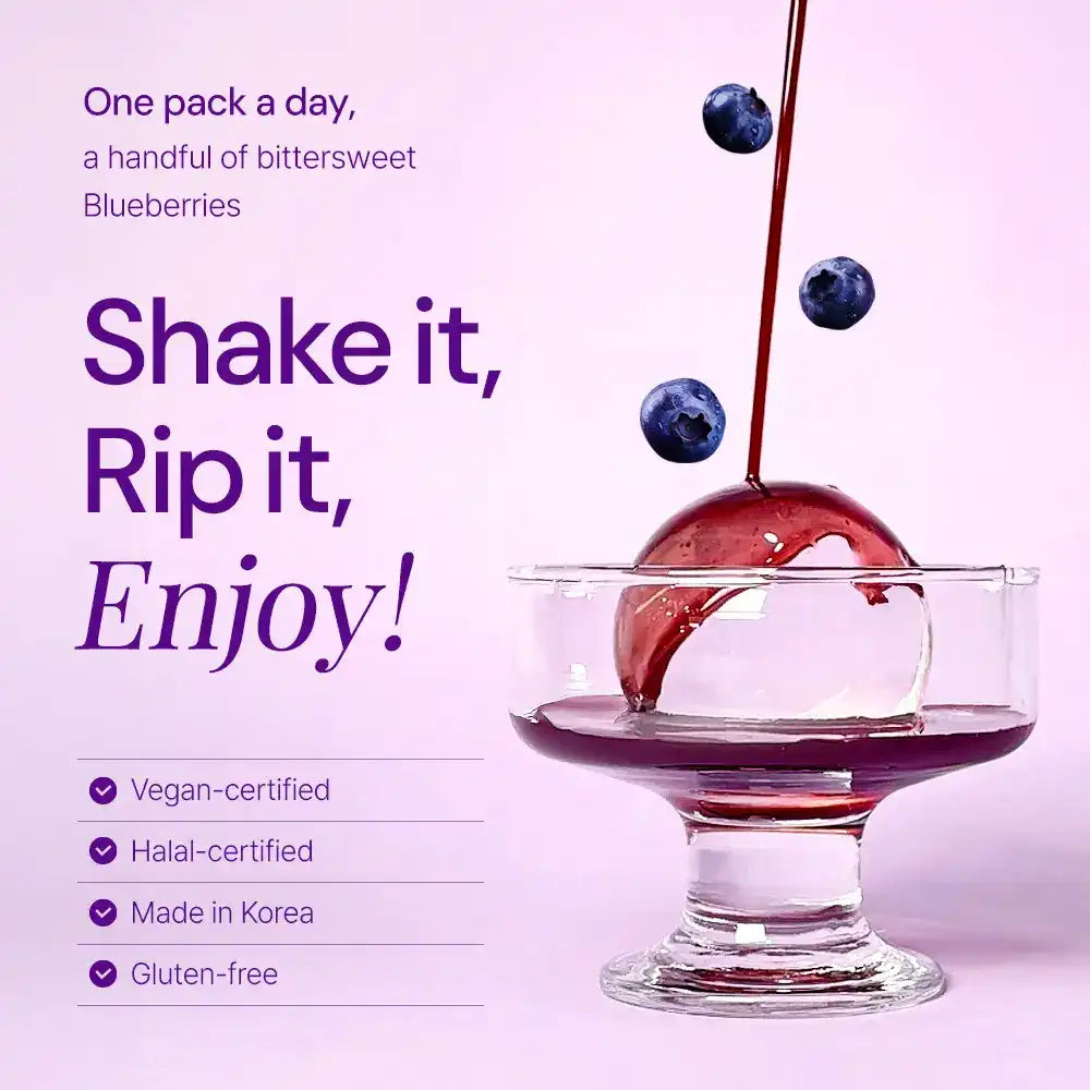 Blueberry supplement liquid being poured over glass with floating blueberries, vegan and gluten-free attributes listed.