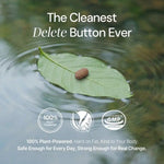 Vegan plant-powered supplement tablet on a green leaf floating in water with certification icons